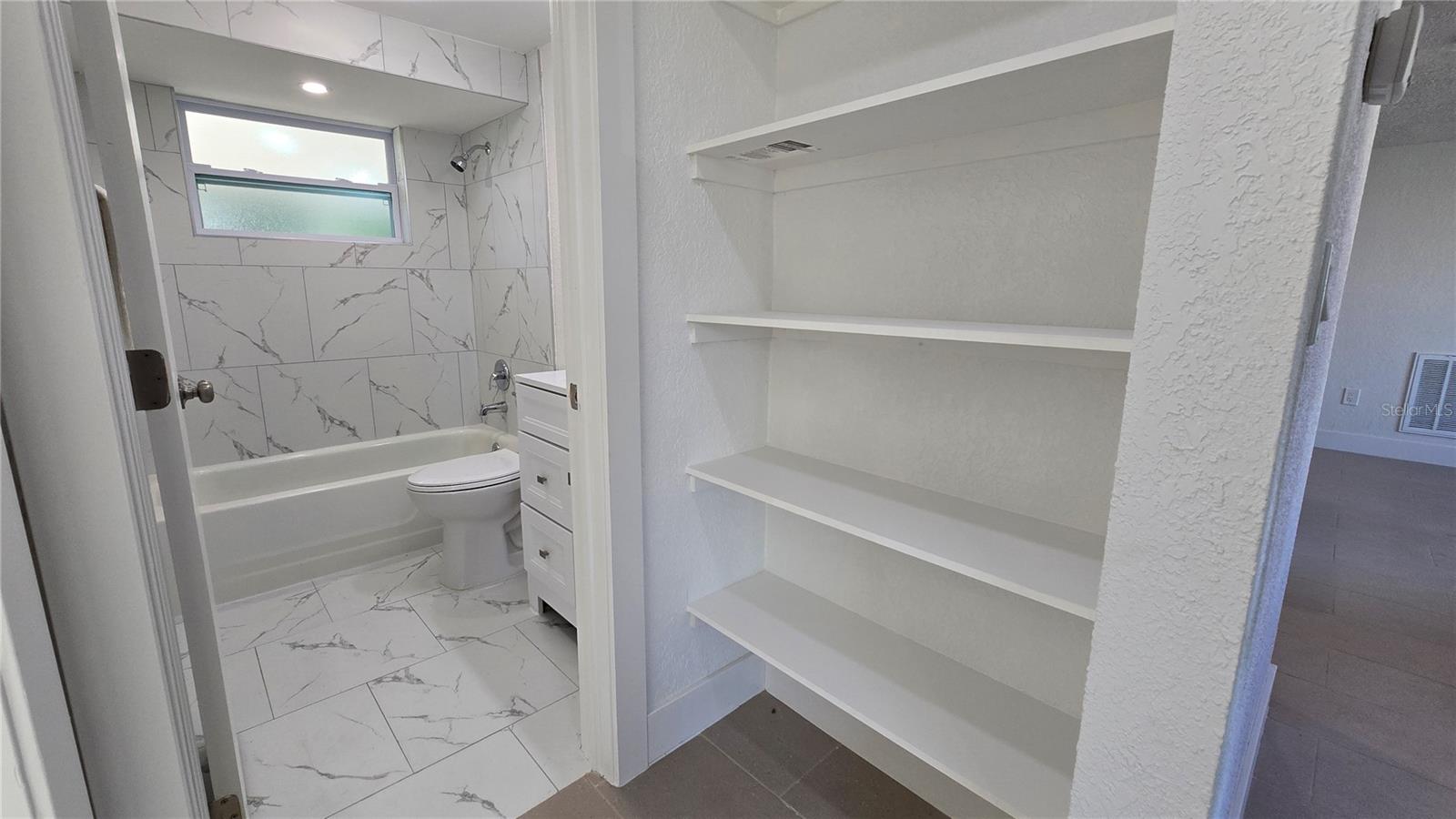 First Bathroom with tub shower combination