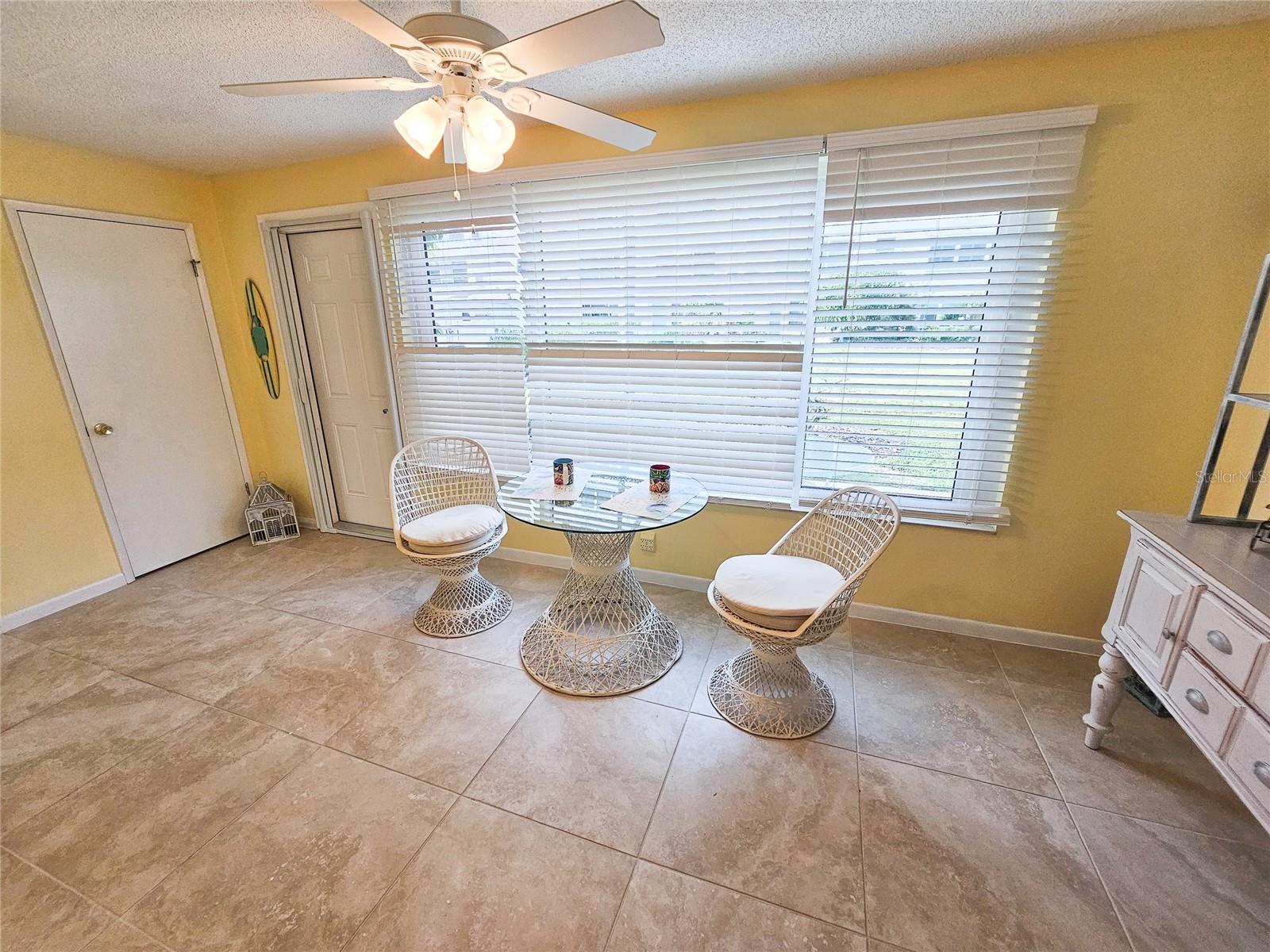 Florida Room Area w/ Outside Patio Access.