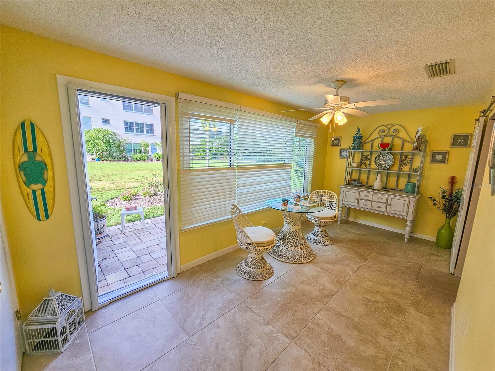 Florida Room Area w/ Outside Patio Access.