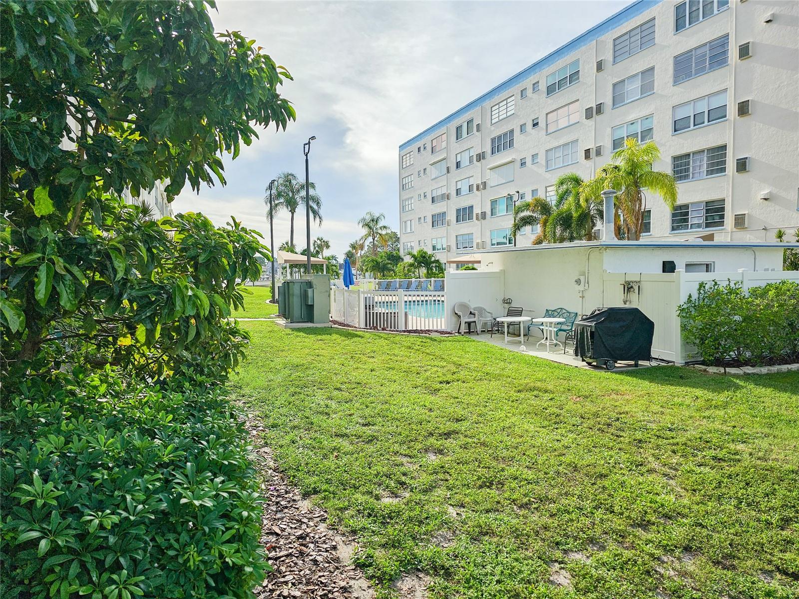 Outside Green Space Just Steps From One of the Four Town Shores Community Pool.