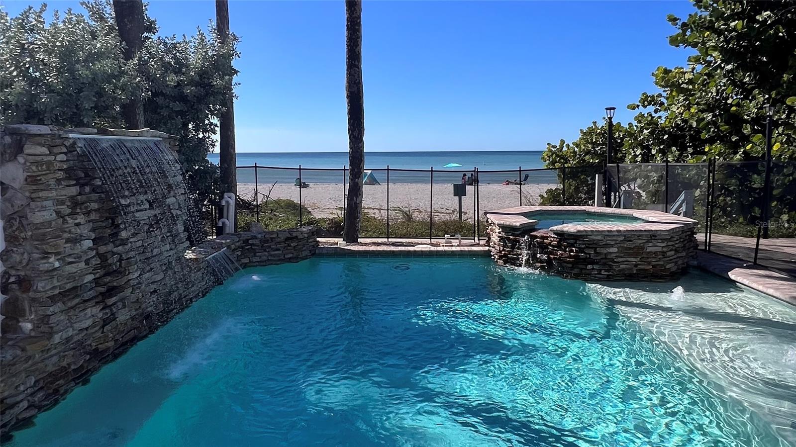 Waterfall, pool, spa, beach