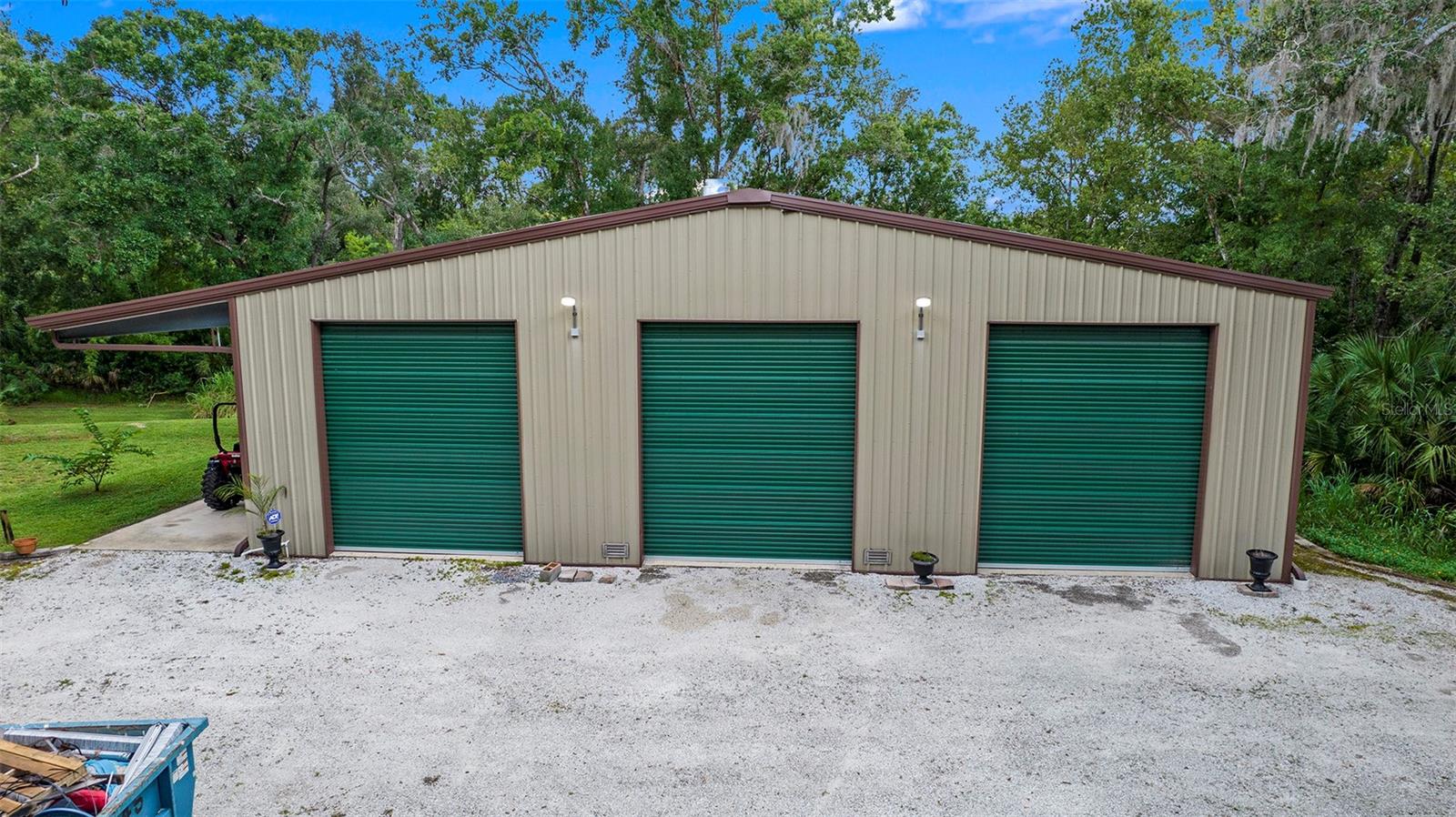 3 bay's - left 2 is the workshop and far right is the RV storage or more workshop