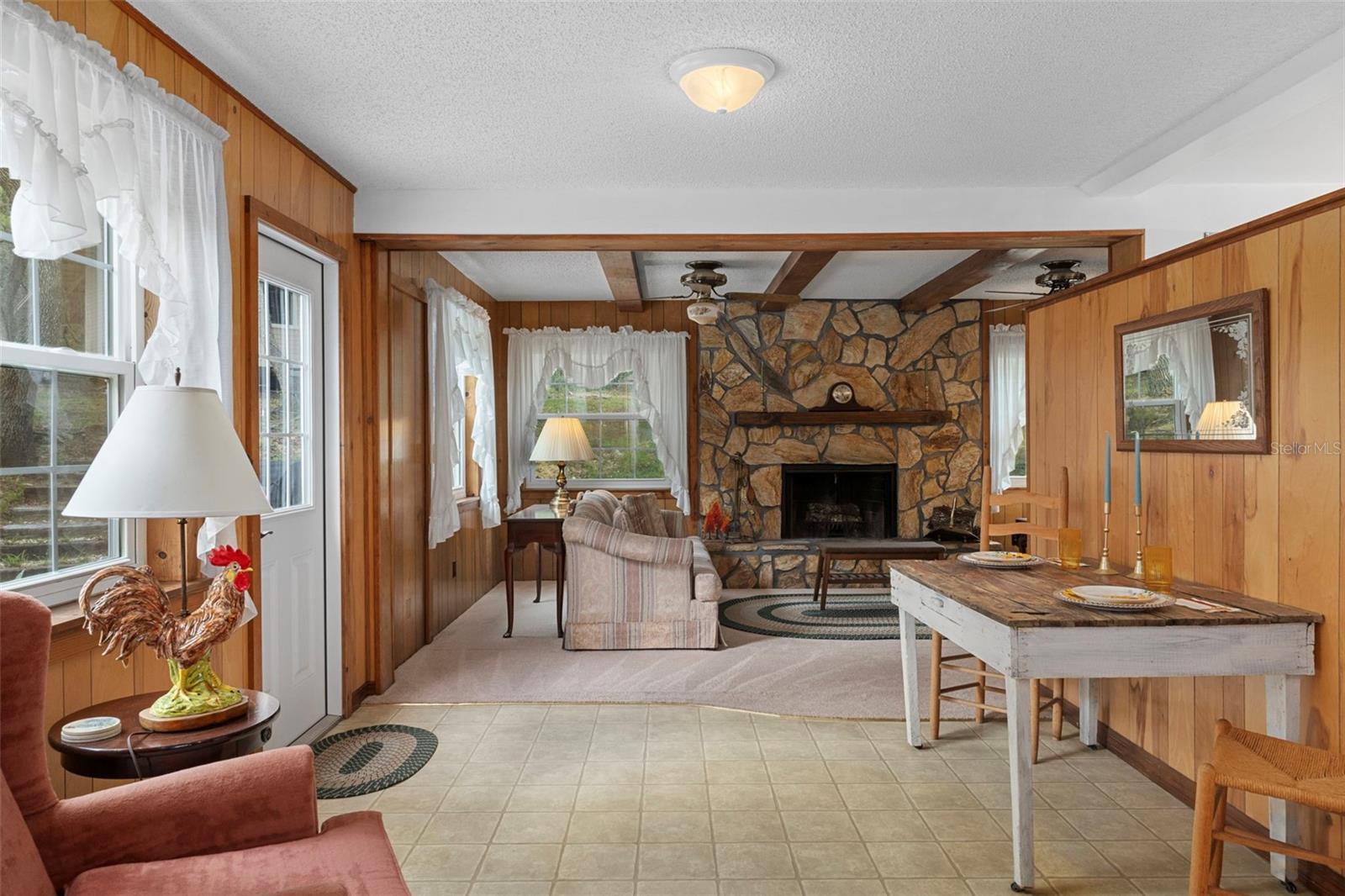 Downstairs dining or seating area. perfect place for light dinner or for the inlaws/guests