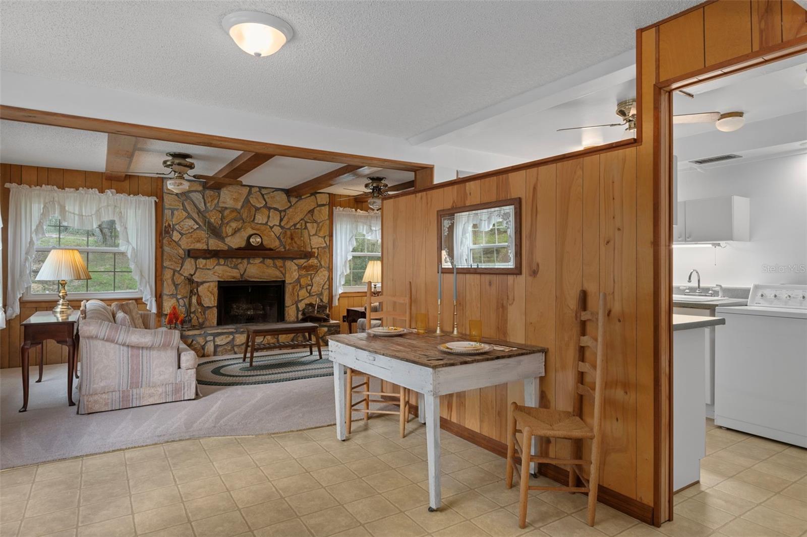 Downstairs dining and 3/4 kitchen/laundry