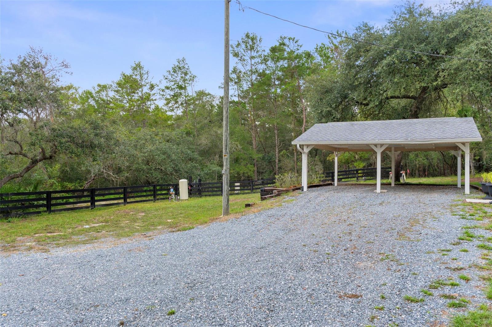 Carport on west side of home