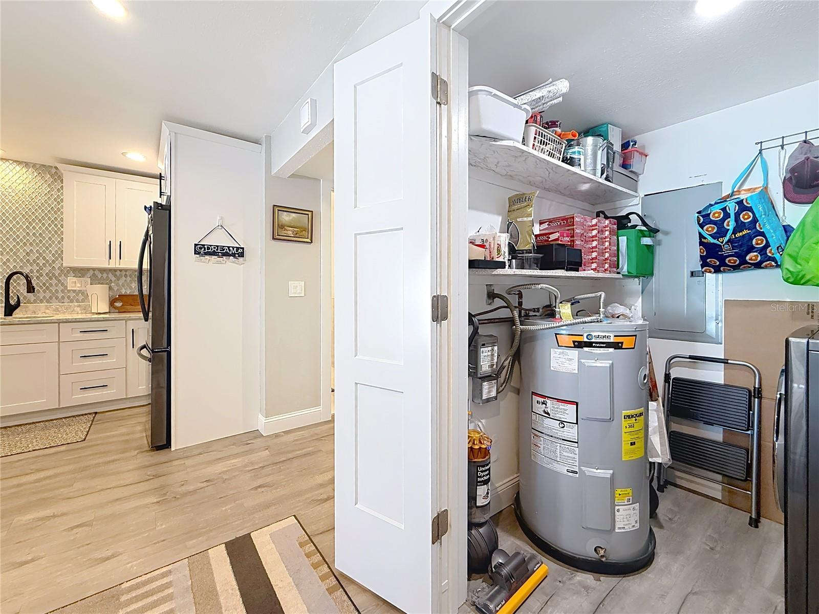 Inside laundry room off kitchen