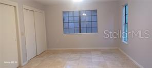 master BR with expensive travertine floor and 2 closets...
