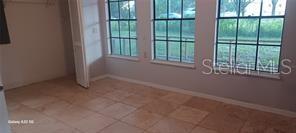 2nd BR with expensive travertine flooring