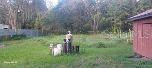 big back yard with sophisticate water treatment...