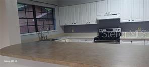 kitchen with huge breakfast bar