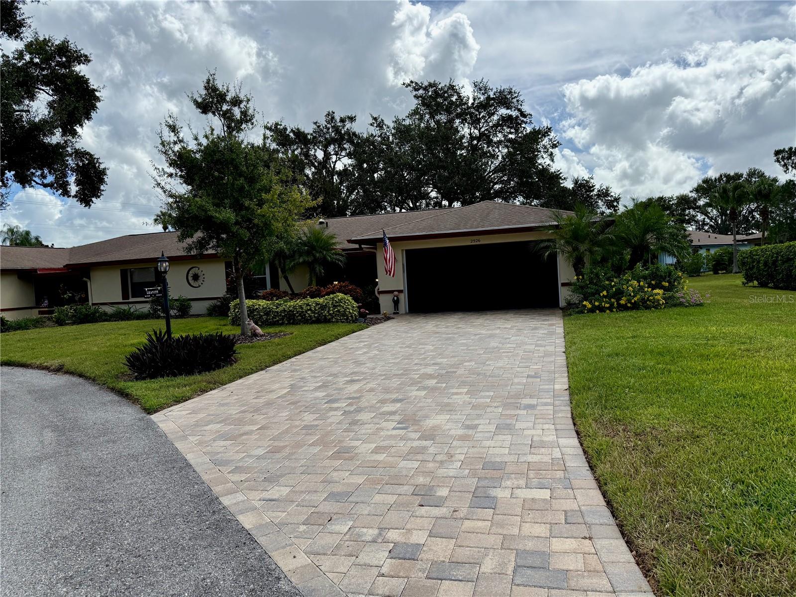 Long, paver brick driveway