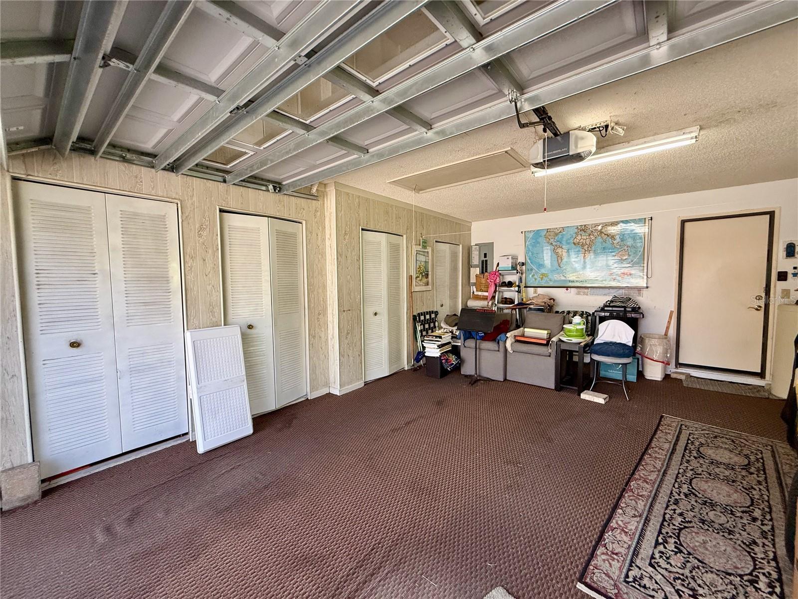 The large two car garage with loads of storage