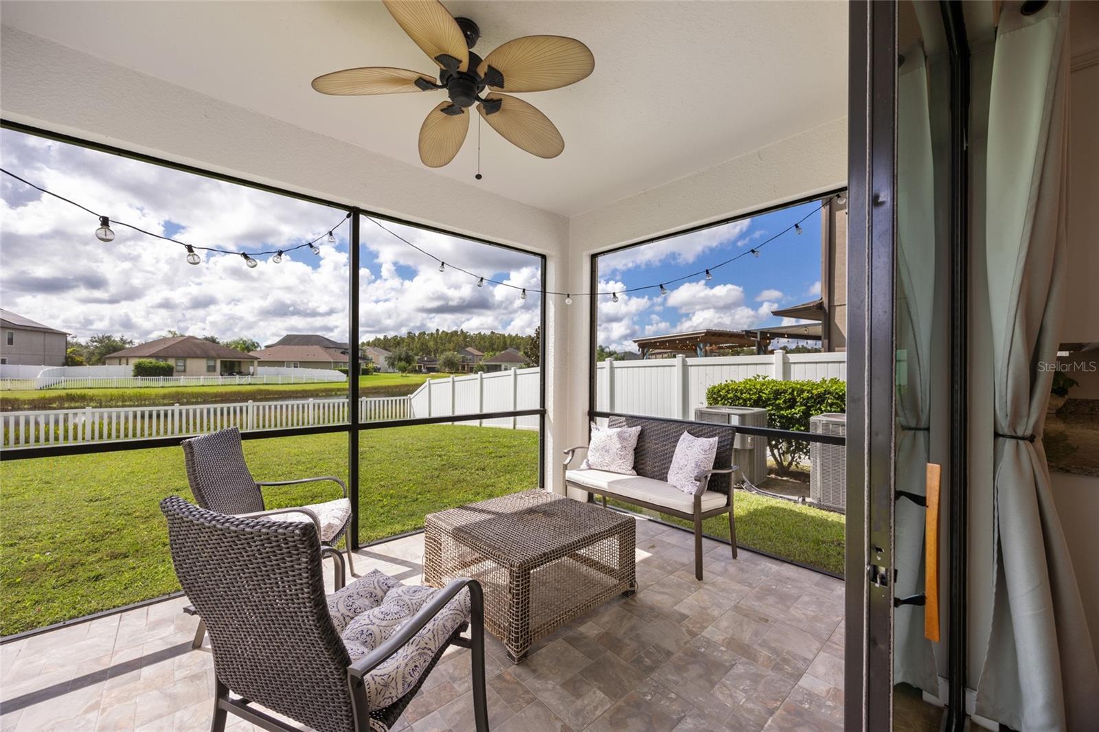 Covered, Screened Back Patio with Pond View