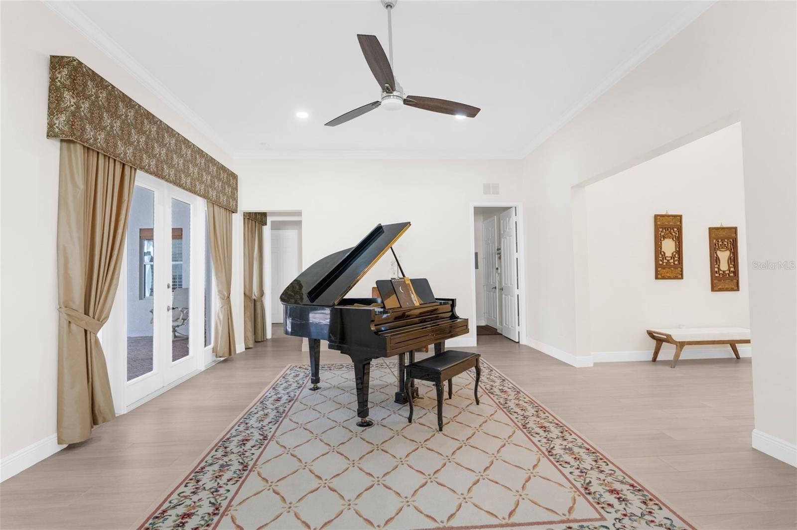 Huge living room with 12 foot high ceilings throughout the whole house.