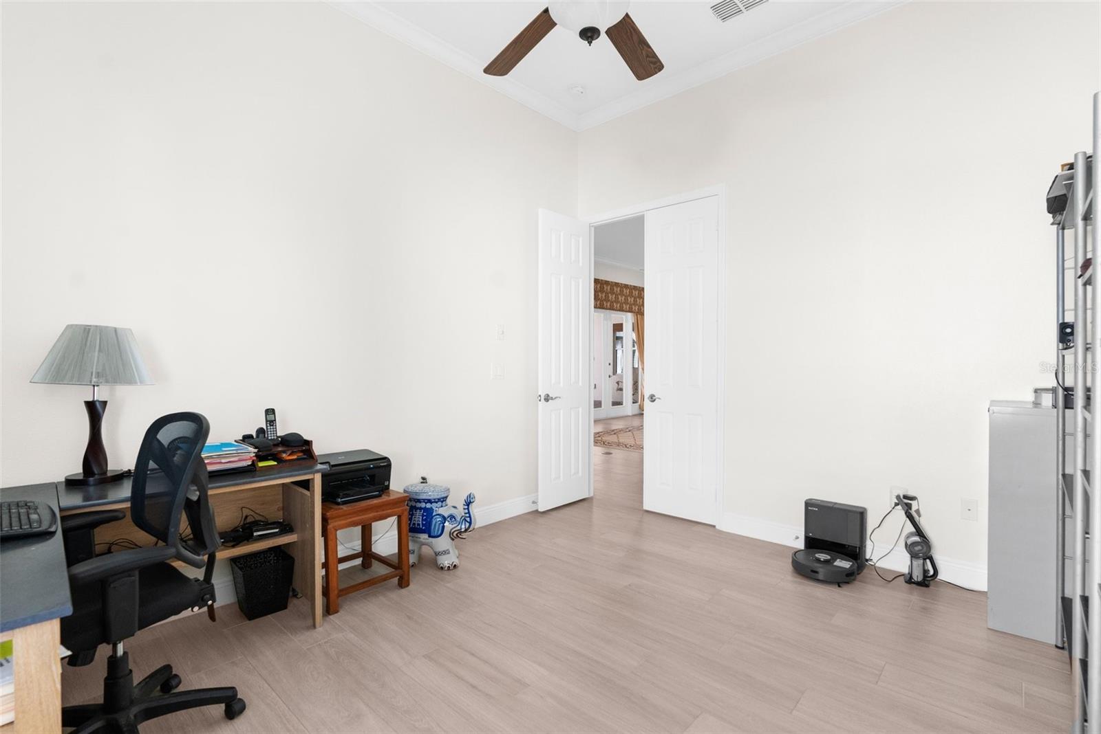 Fourth bedroom or office through double doors.
