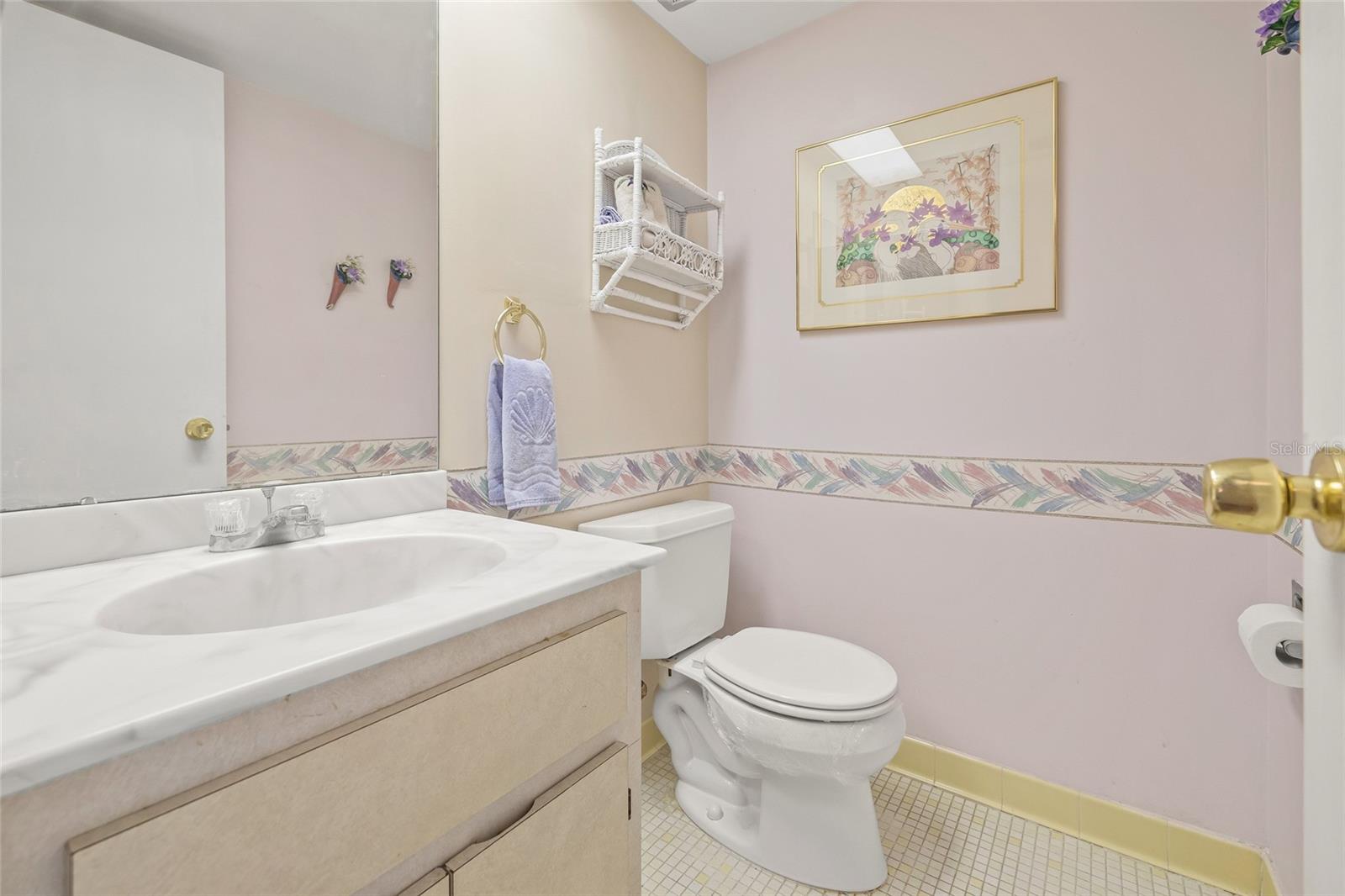 Hallway half bathroom.