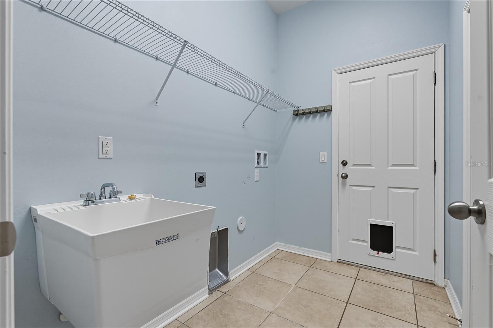 Laundry Room with Entry to Garage