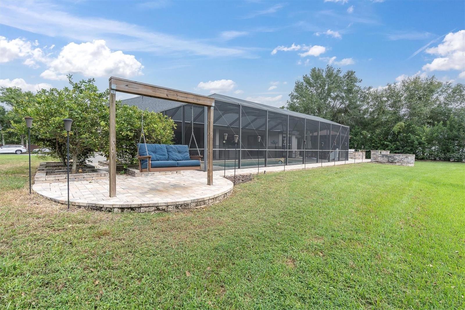 Outdoor swing and fruit trees