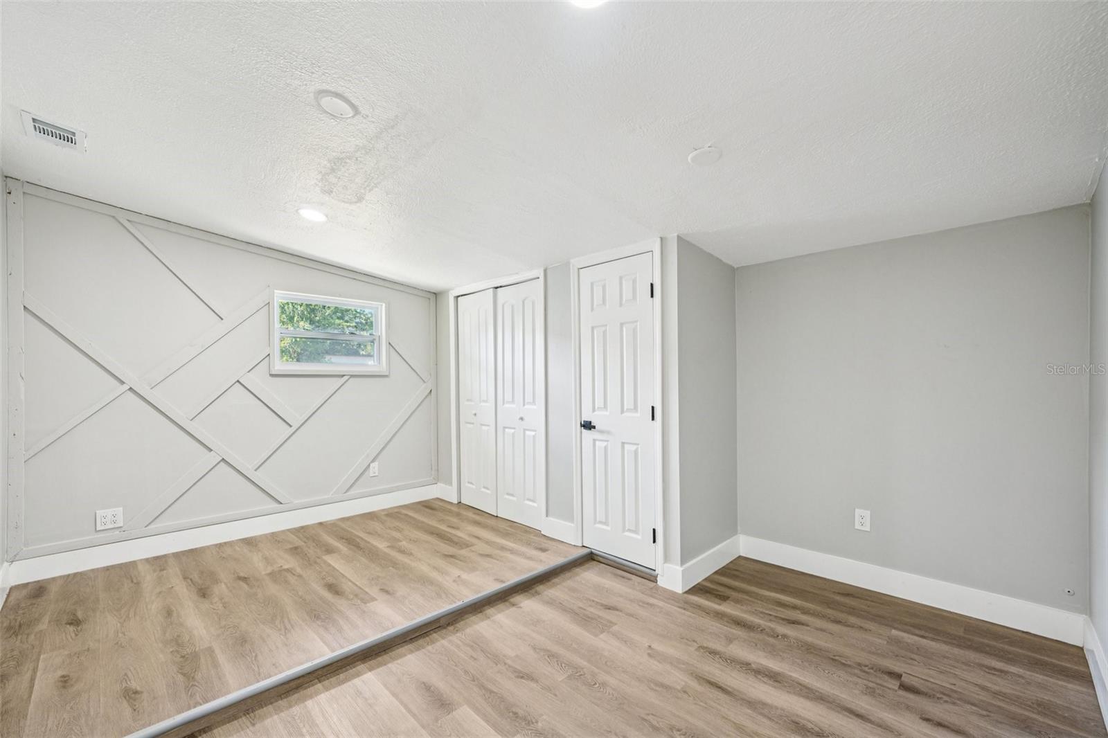 Third Bedroom located of Living Room with 2 closets