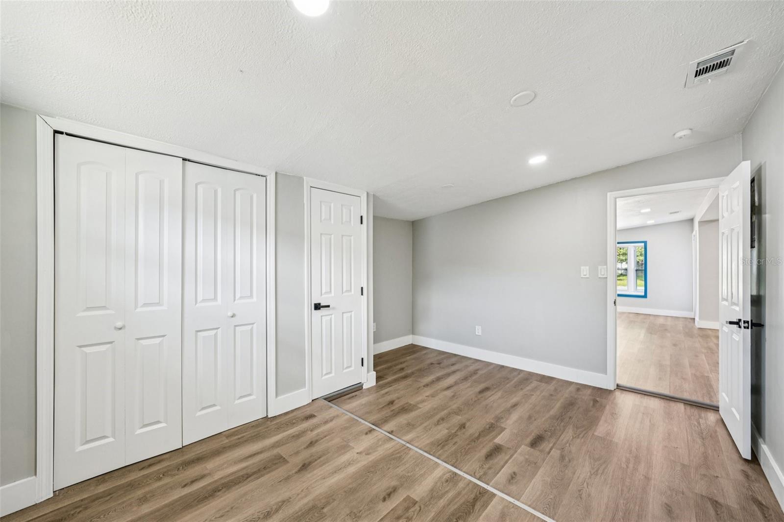 Third Bedroom located of Living Room with 2 closets