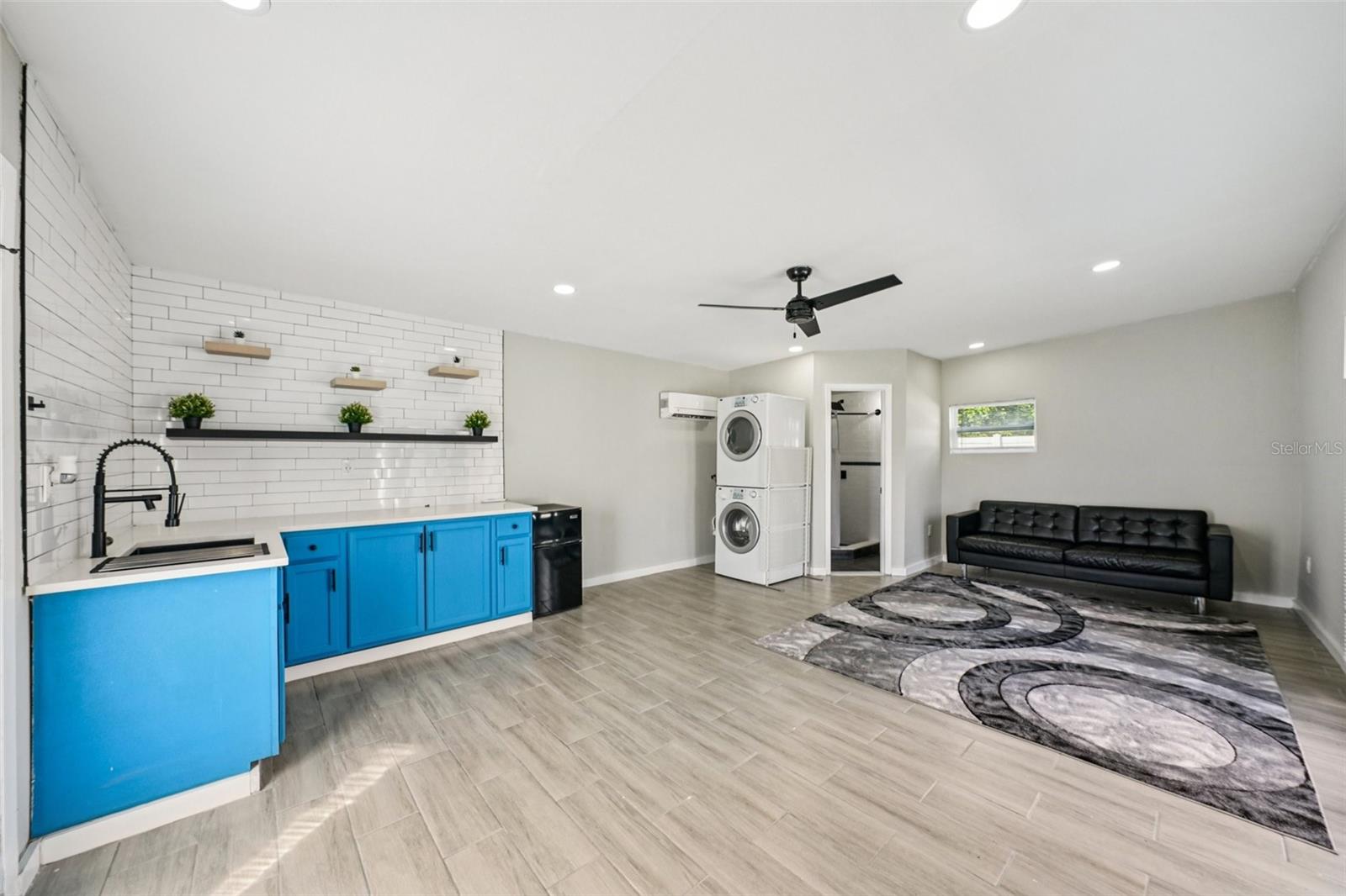 Detached Studio with separate AC, Laundry, Kitchenette and full bathroom.