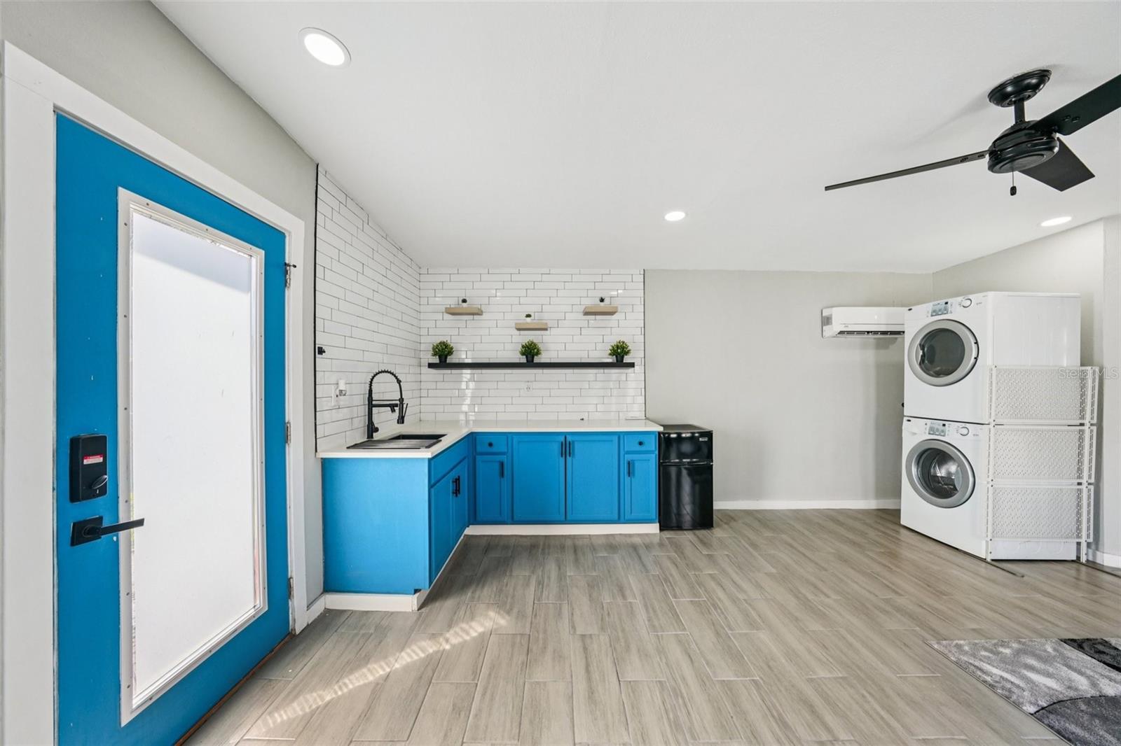 Detached Studio with separate AC, Laundry, Kitchenette and full bathroom.