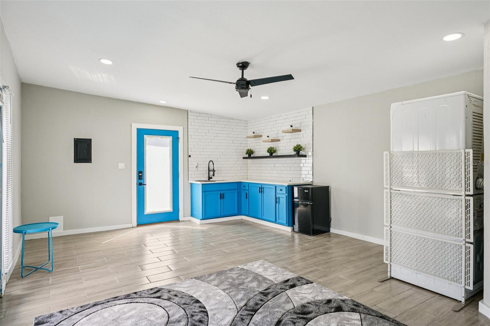 Detached Studio with separate AC, Laundry, Kitchenette and full bathroom.