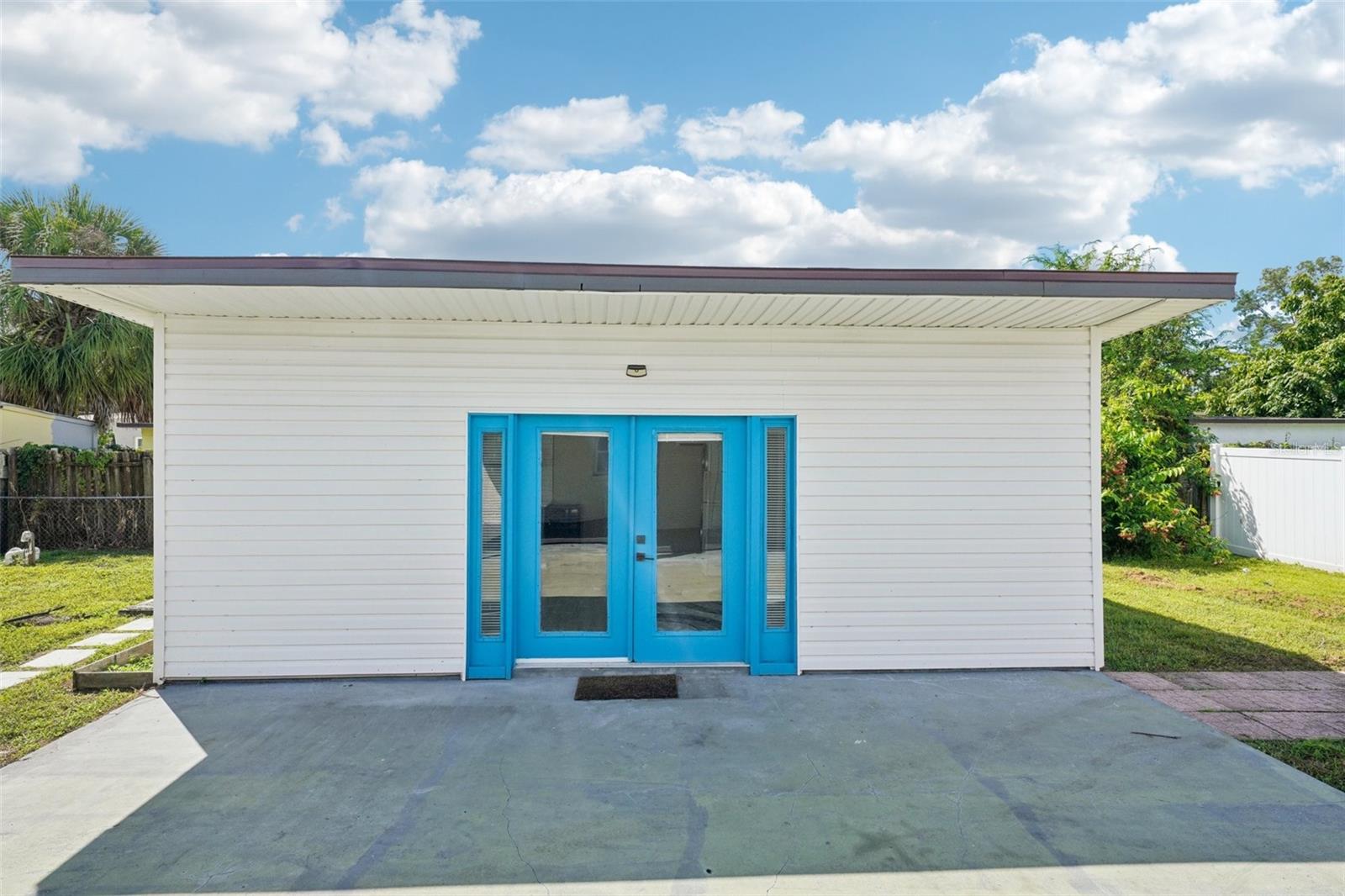 Detached Studio with separate AC, Laundry, Kitchenette and full bathroom.