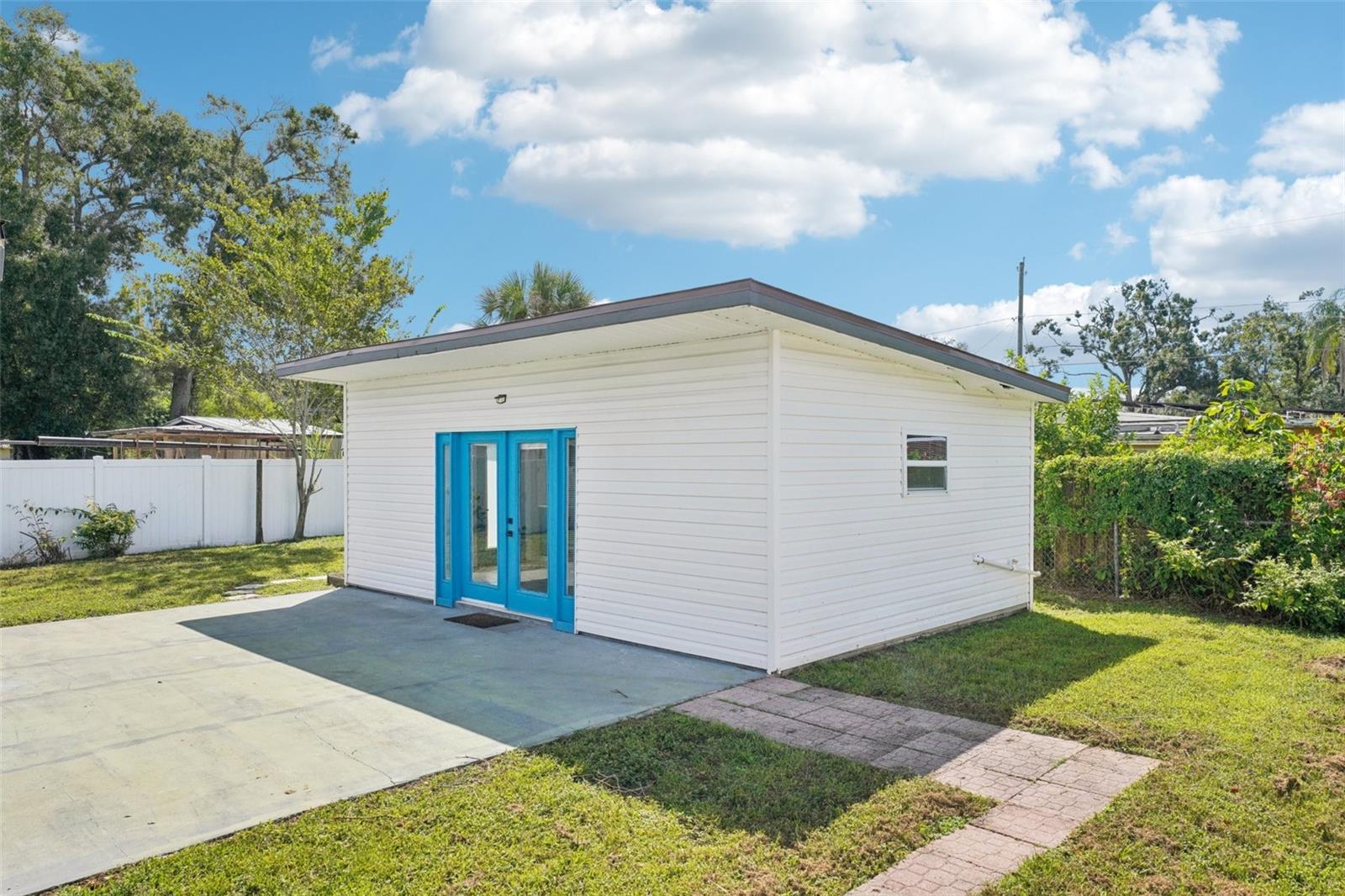 Detached Studio with separate AC, Laundry, Kitchenette and full bathroom.