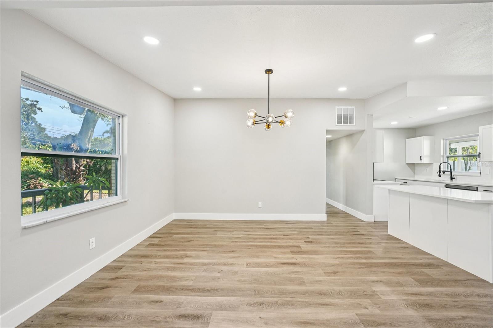 Dining area off kitchen with window view out front