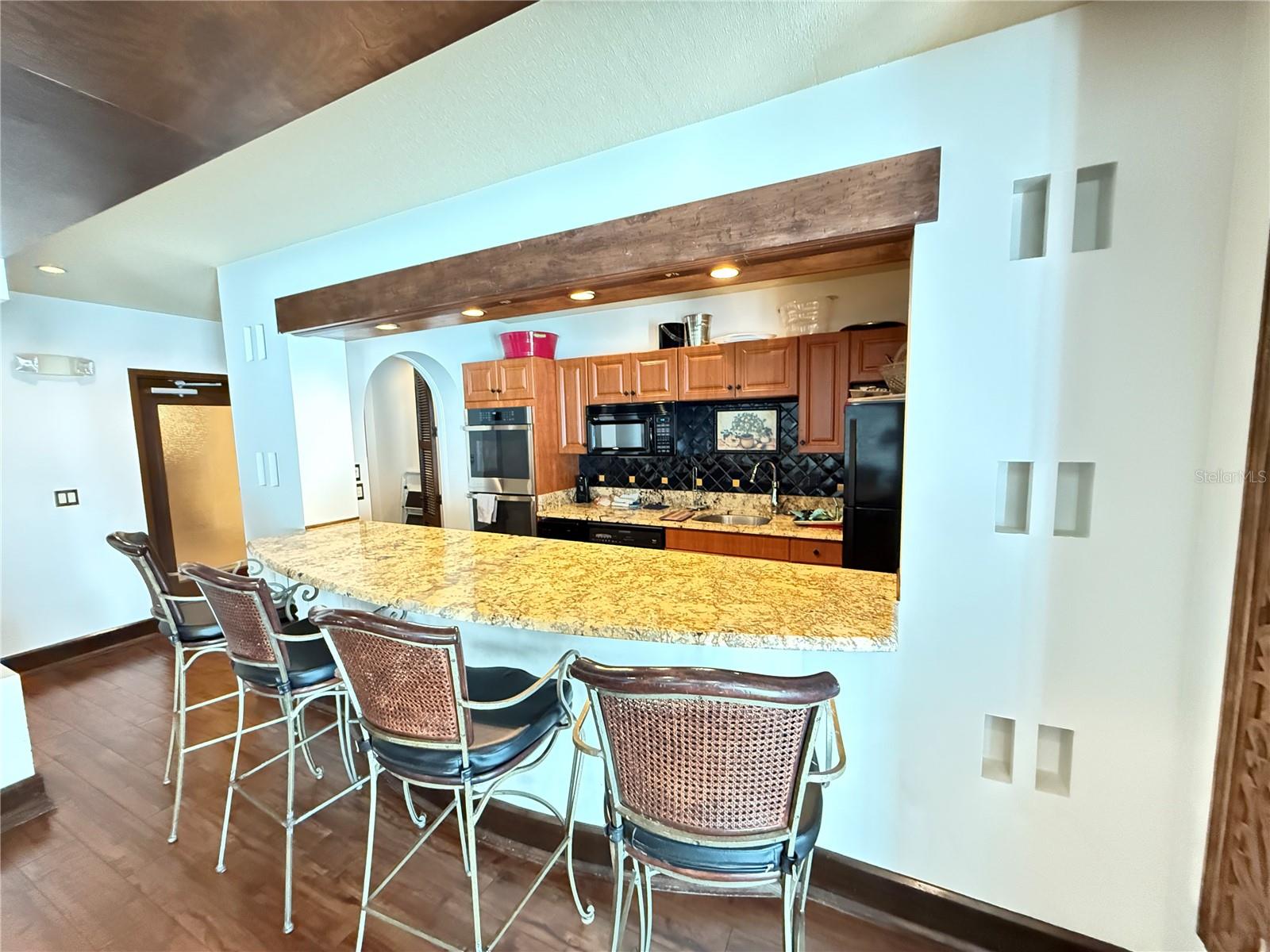 Bar counter kitchen in the reservable function/get together room.
