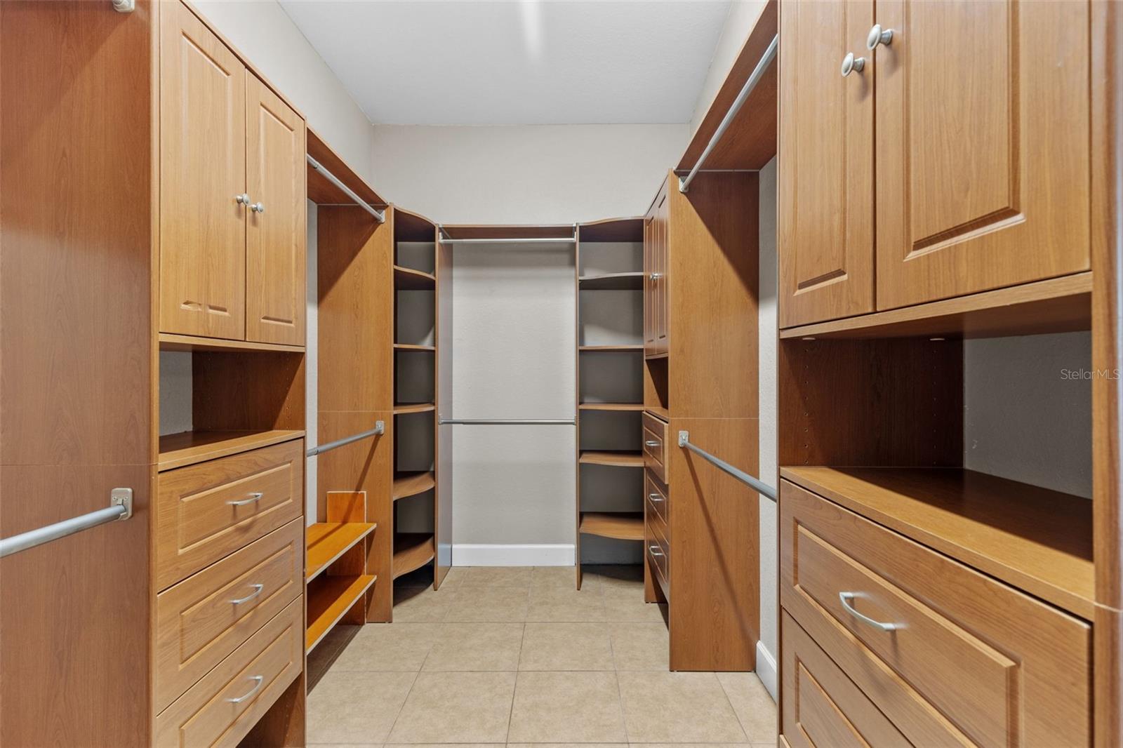 Primary Walk in Closet with Built-ins