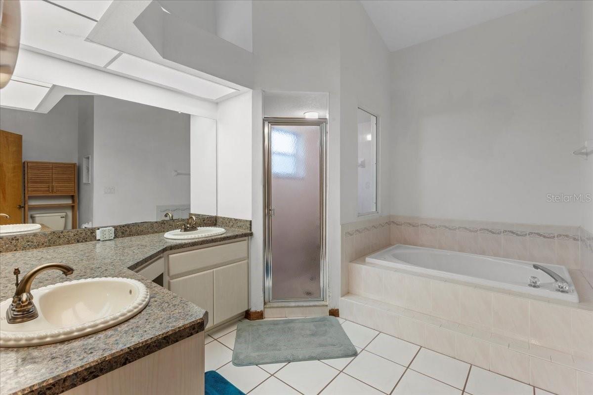 Master Bathroom with separate shower and garden tub