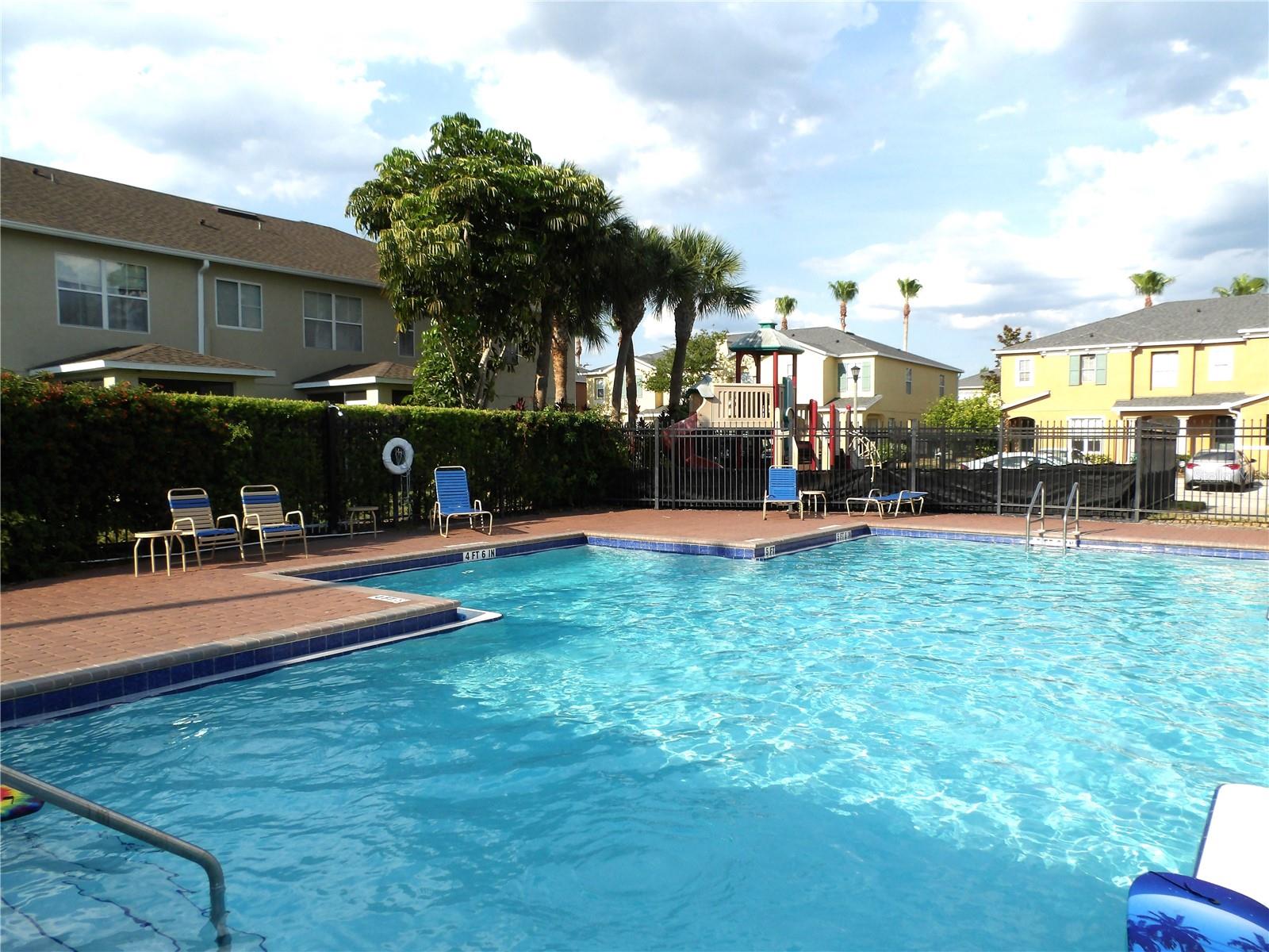 Enjoy A Dip In The Sunset Community Pool