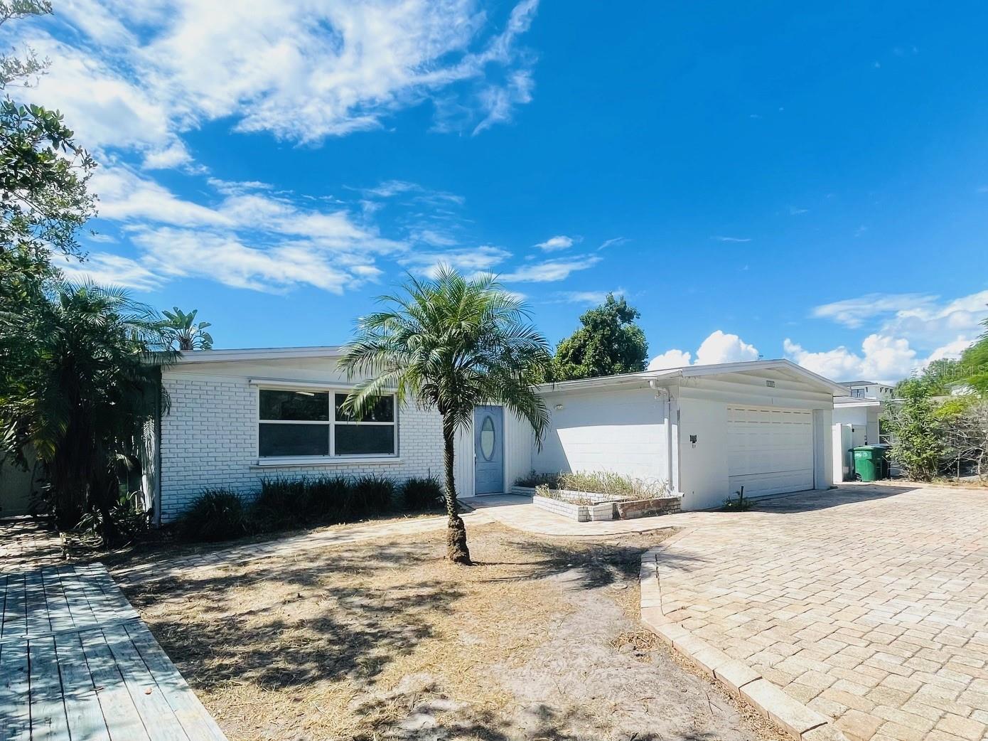 Front door and garage (east side)