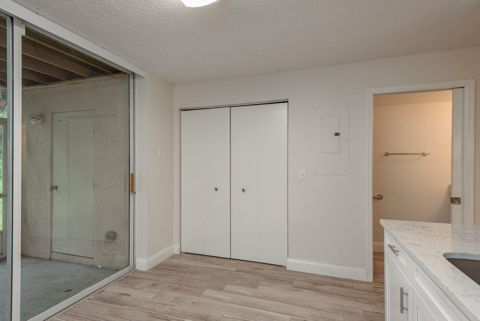 Doors to laundry/pantry and powder room
