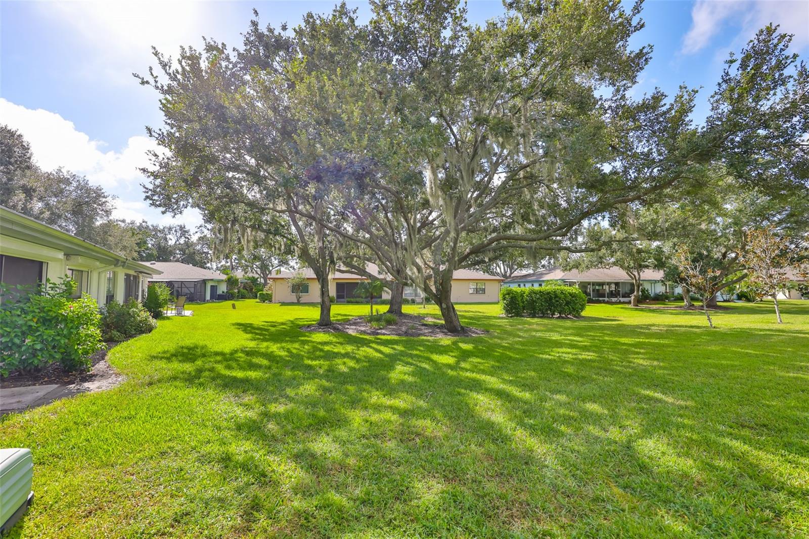 Charming Yard giving great separation of condos