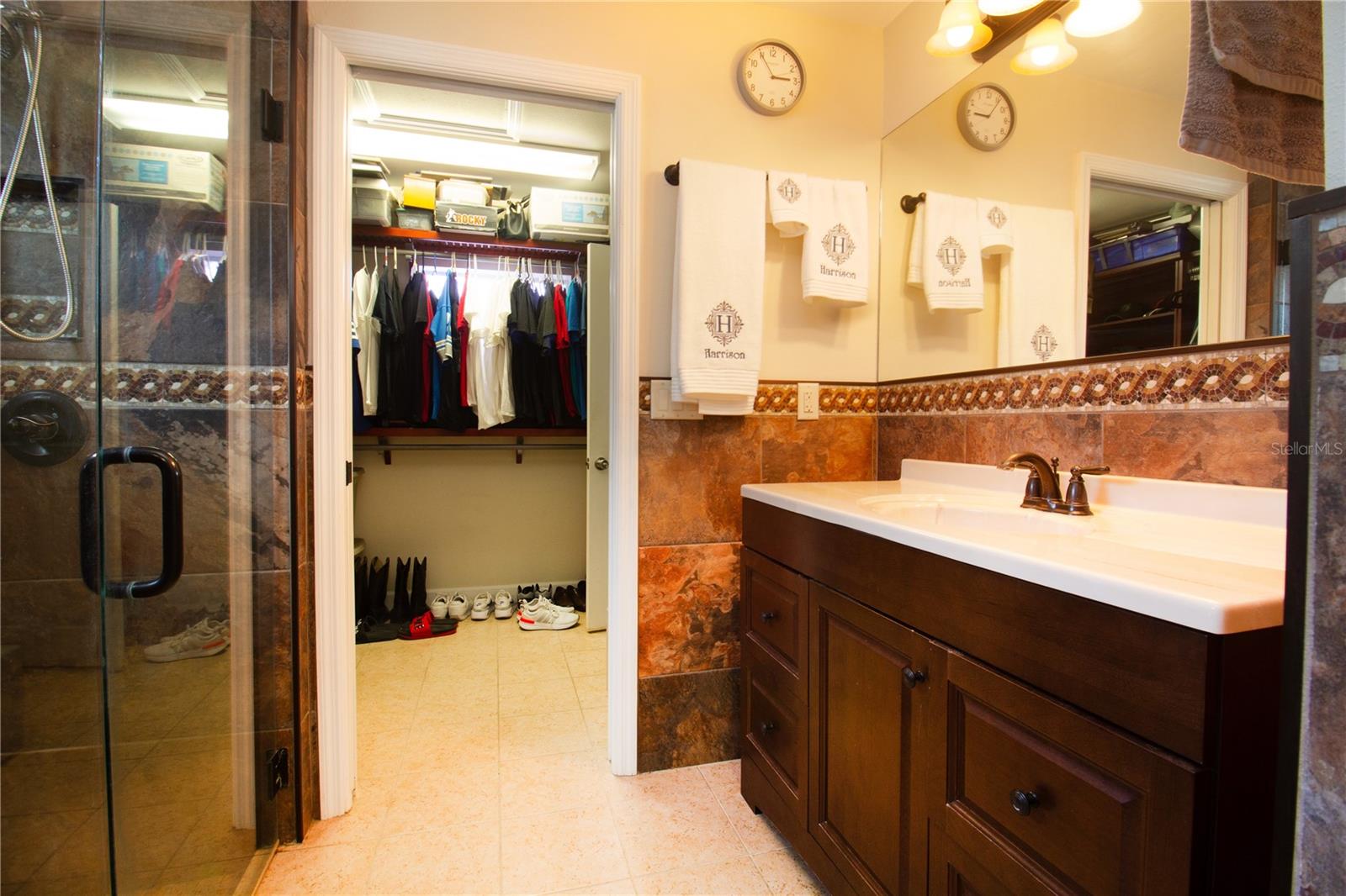 Primary Bathroom with access to Primary Closet