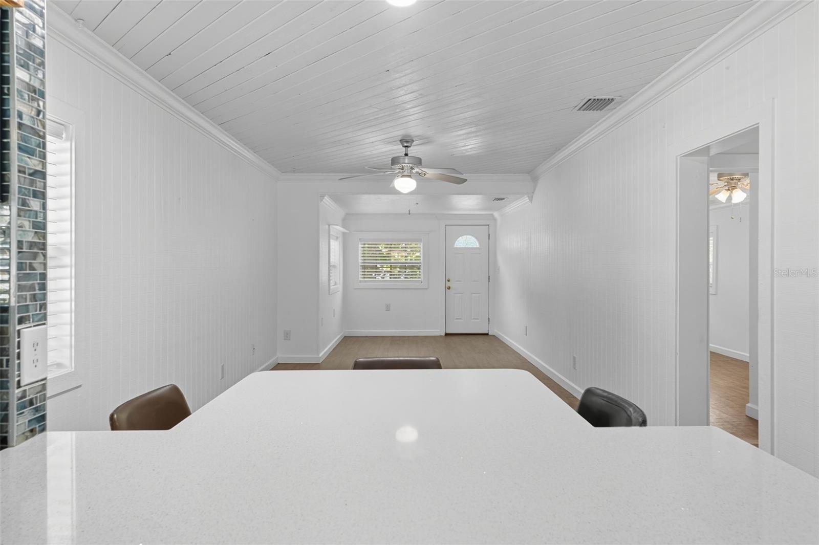 Open sightlines from the kitchen to the living area, making the space feel bright and connected.