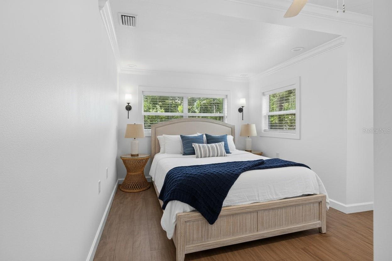 Another option in the owner's bedroom offers flexible design easily accommodates a king-size bed and additional seating area, making this space both functional and inviting.