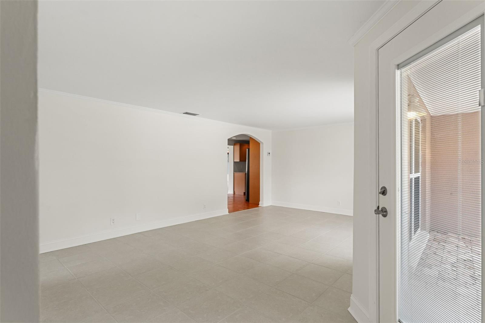 Bright, freshly painted interiors and crisp lines create a modern, move-in-ready feel throughout.