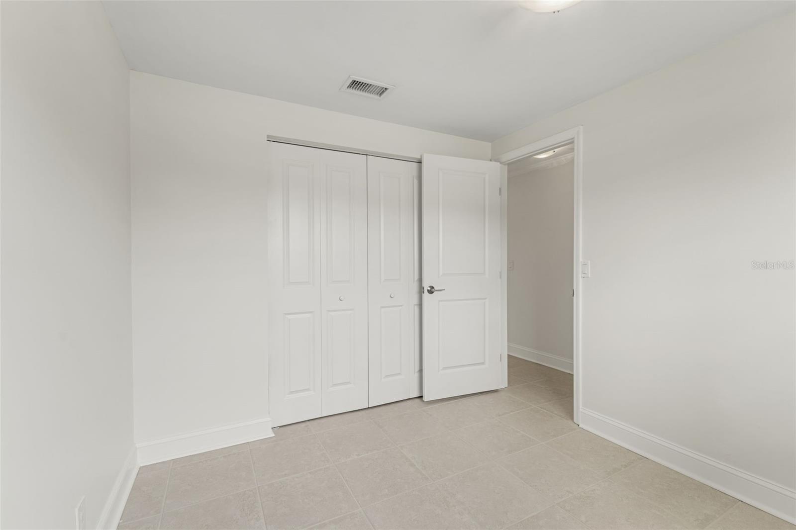 Features a spacious closet and fresh paint, ready to personalize as a guest room, nursery, or home office.