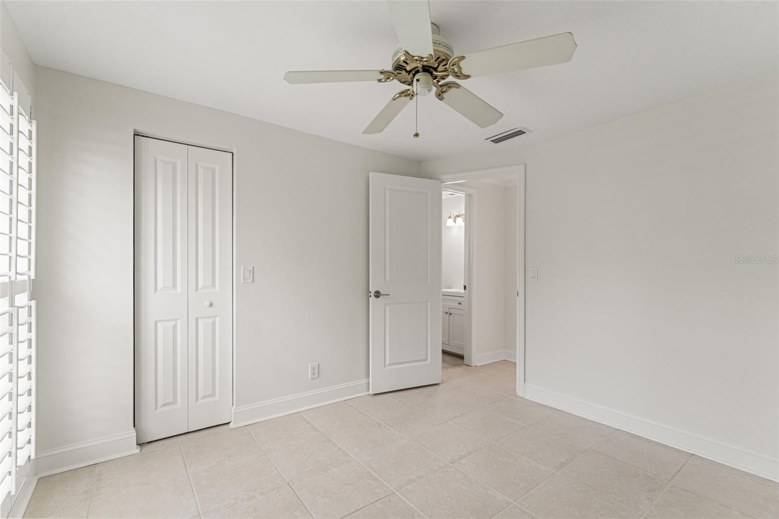 Offers dual closets and an ensuite bath for convenience and privacy.
