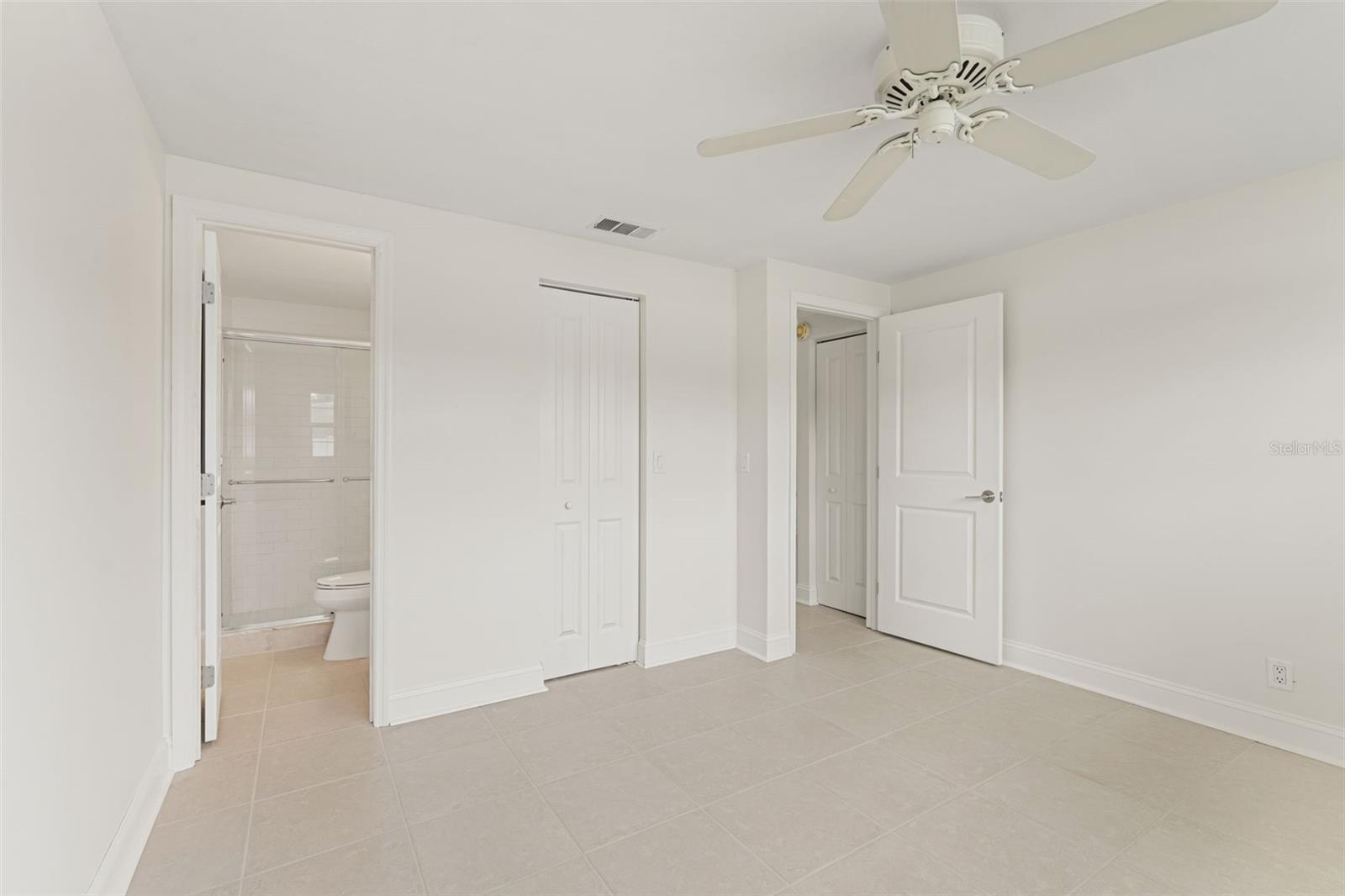 Features ample closet storage and direct access to the full hall bath.