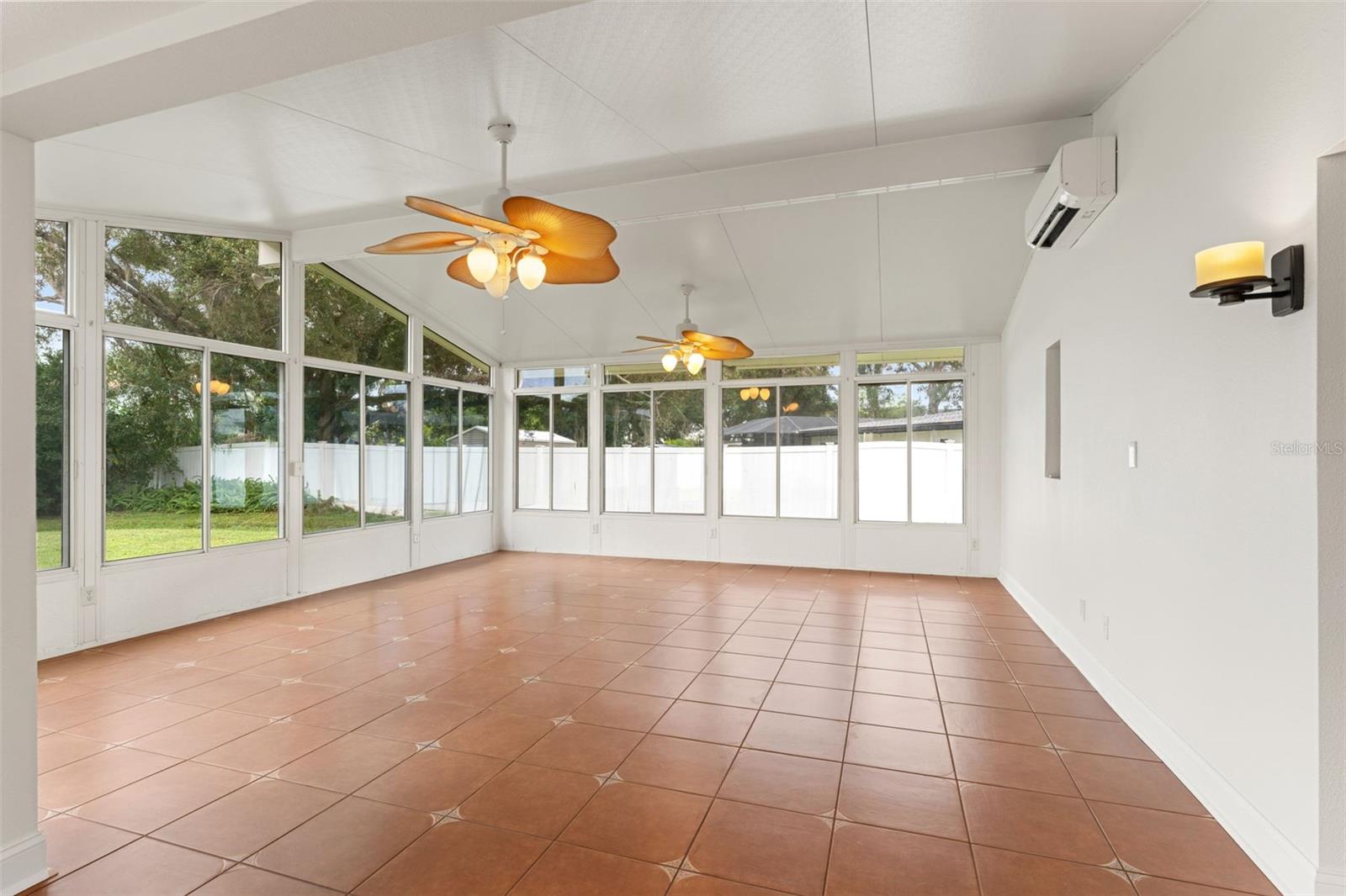 Generously sized space ideal for a second living area, playroom, or home gym, complete with its own mini-split AC for year-round comfort.