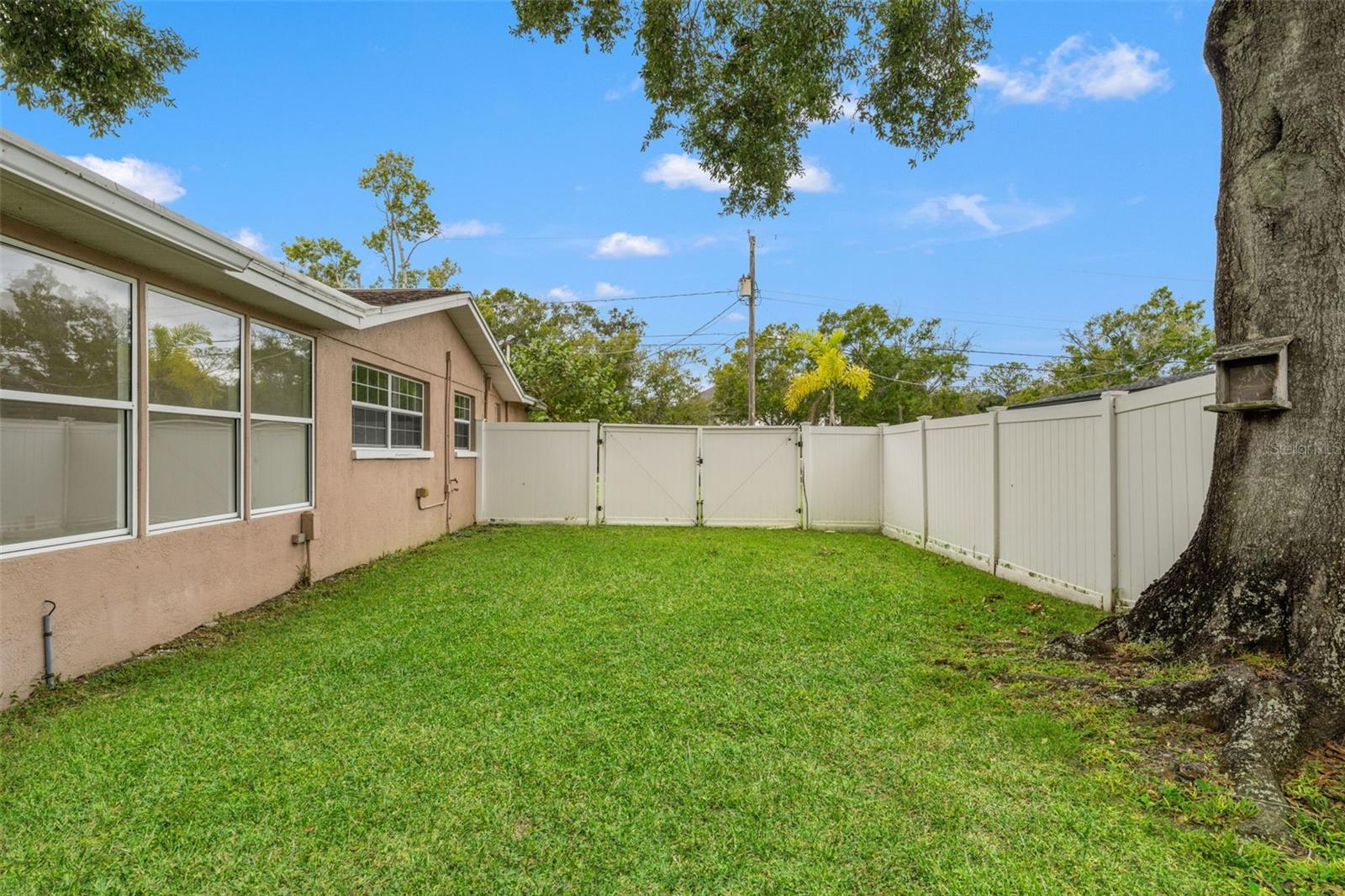 Double gate entry provides convenient access for RV or boat parking.