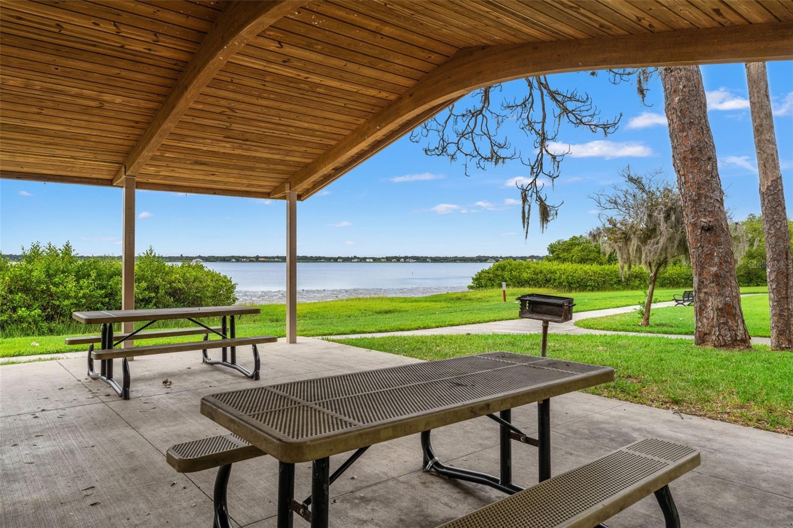 Covered picnic shelters with barbecue grills and serene bay views—perfect for weekend gatherings.