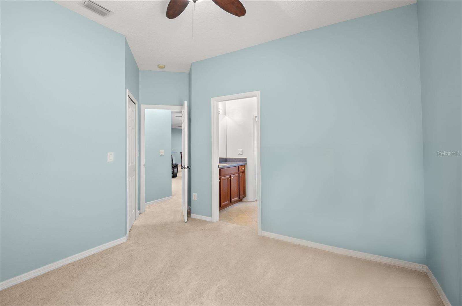 4th bedroom with attached bath with pool access