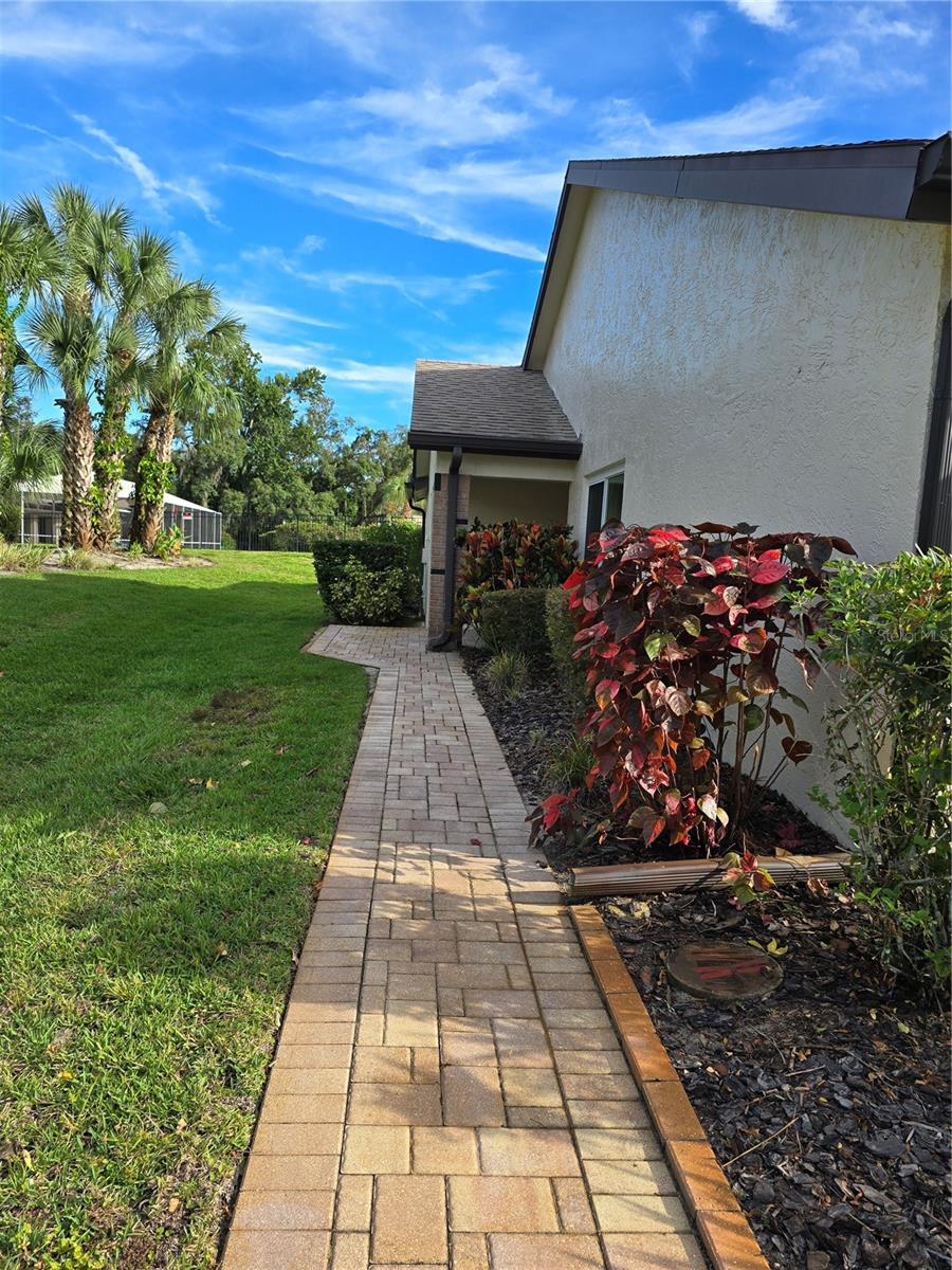 SIDEWALK TO ENTRANCE