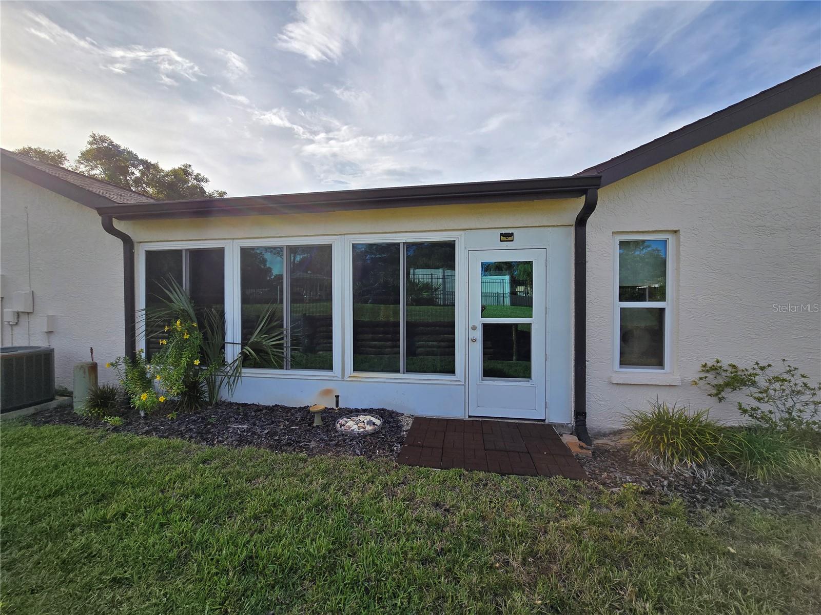 REAR EXTERIOR OF HOME